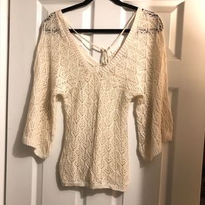Crocheted knit sweater with sparkle.